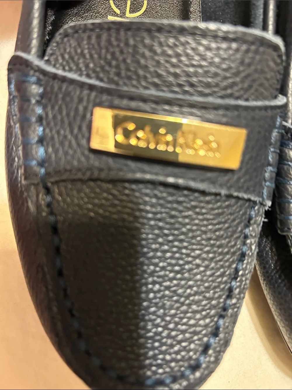 Calvin Klein Women's Navy Leather Moccasin Loafers with Gold Plaque